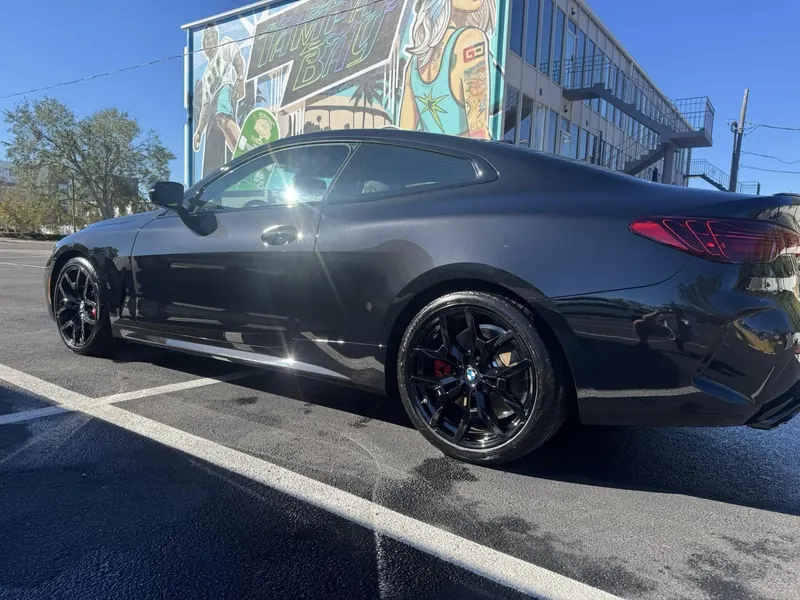 Black BMW coupe with a ceramic coating shine